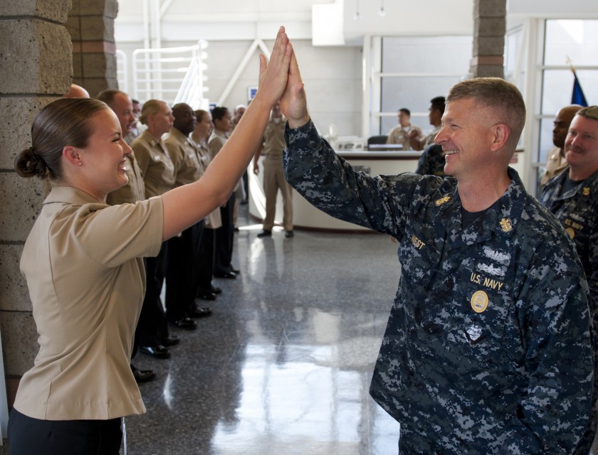 studying in the US_high fives Commander