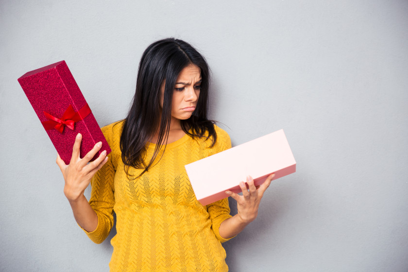 English phrases Gutted dissapointed woman with present