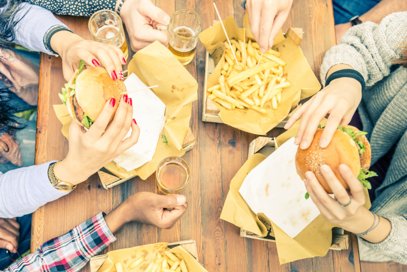 english phrases grub burgers and chips on a park bench