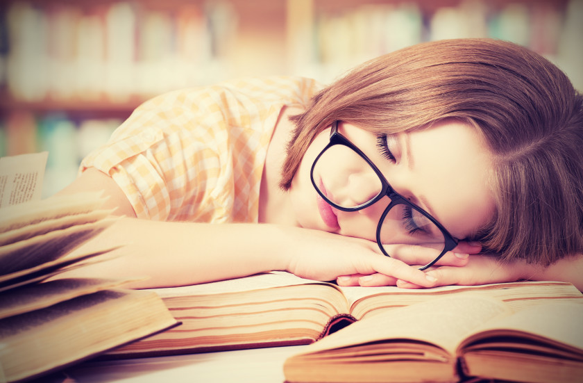 english phrases knackered tired student sleeping on books