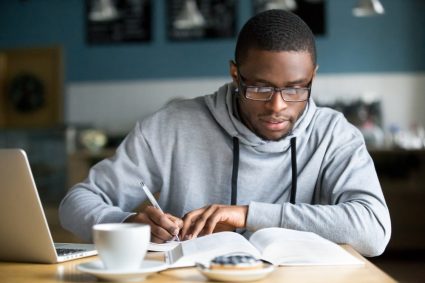 A young college student studying