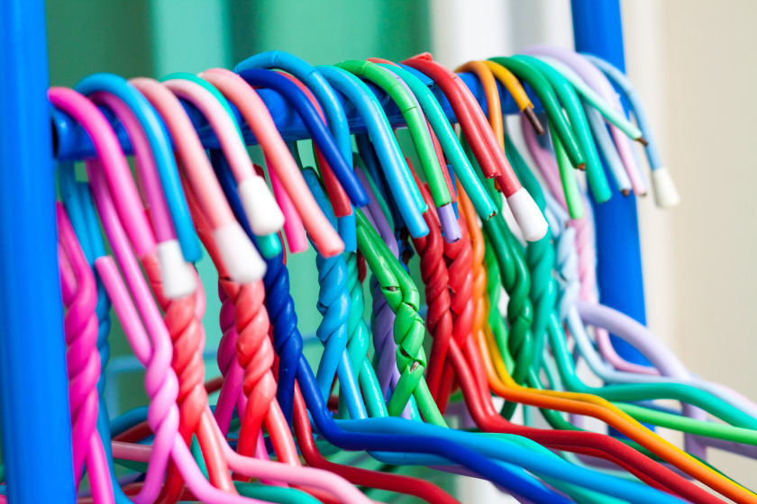 A row of colourful hangers