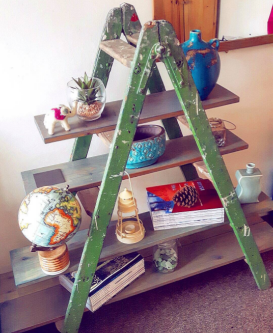 A bookshelf made out of a stepladder