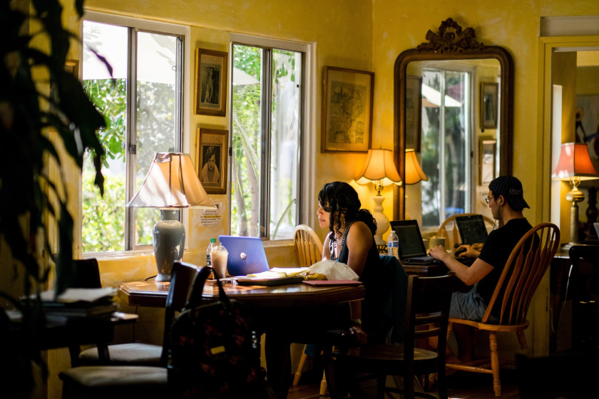 Two business students studying in a room