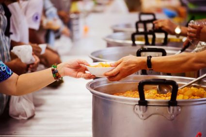 Students volunteering in a soup kitchen