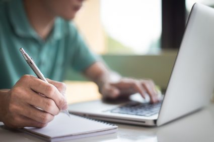 A man taking notes