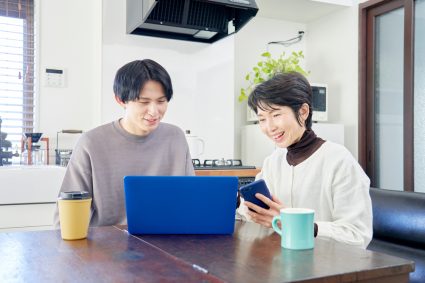 A university student with his mother