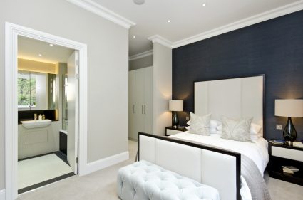 A bedroom with an en-suite bathroom