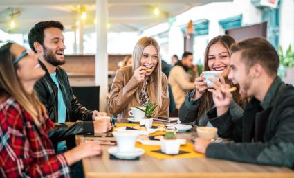 A group of students eating together