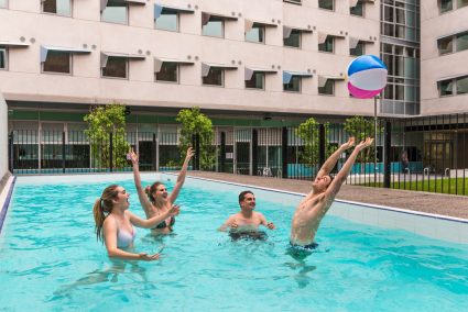 Students in a swimming in Student Village Melbourne