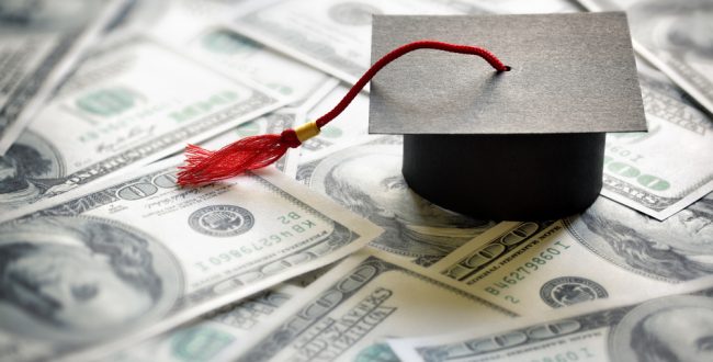 A student's graduate hat and some money