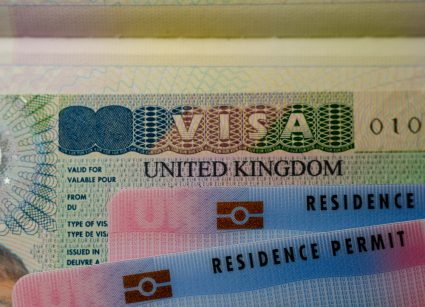 A photo of a UK visa and residence permit card
