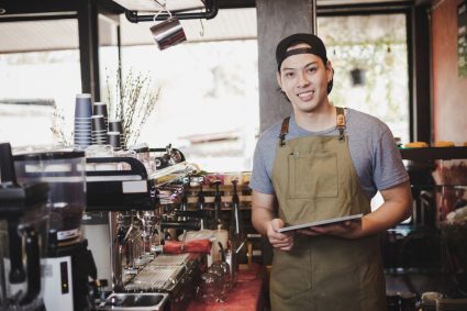 A student working part time as a barista