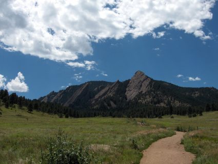 A trail outside Boulder, Colorado with Flatirons in the background