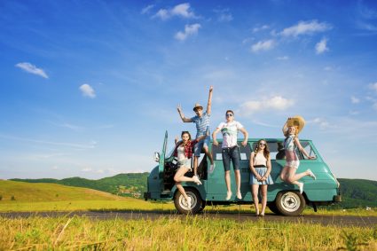 A group of friends travelling in a van