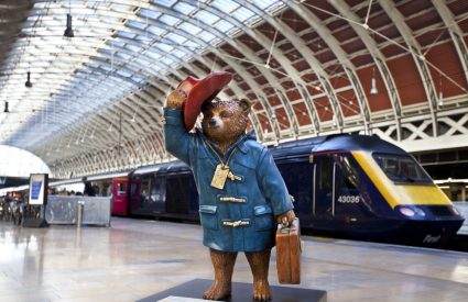A statue of Paddington Bear in Paddington Station in London