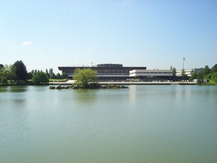 The École Polytechnique of the Polytechnic Institute of Paris behind a lake