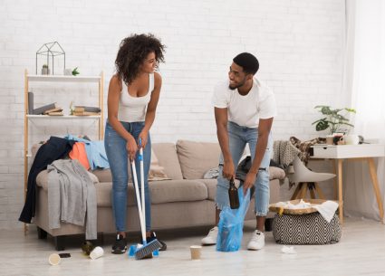 Two students cleaning together