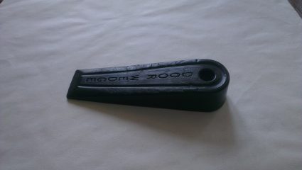 A black rubber doorstop