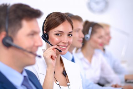 Customer service professionals talking on the phone to customers