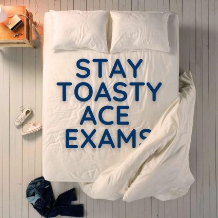 A bed with the text "Stay toasty ace exams"