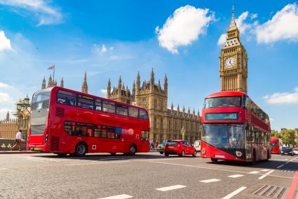 Double decker buses in front of the Big Ben in London, United Kingdom