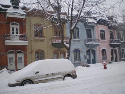 A wintry scene with colourful houses in Le Plateau-Mont-Royal, Montreal