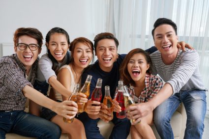 A group of young people drinking non-alcoholic beer