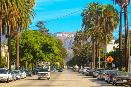 A street in Los Angeles with the Hollywood sign in the background